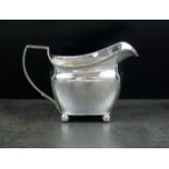 A George III silver cream jug, *M, Londo