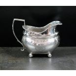 A George III silver cream jug, *W, Londo