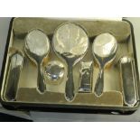 A cased silver mounted dressing table se