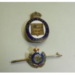 A yellow metal and enamel military Royal