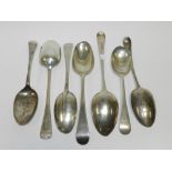 A Hanoverian and rat tail silver spoon, together with six Old English pattern silver spoons, of