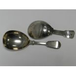 A William IV silver caddy spoon hallmarked London 1830, together with a further silver caddy spoon