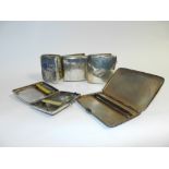 A collection of five silver cigarette cases, various makers and dates