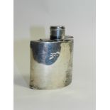 A goldsmiths and silversmiths silver hip flask, hallmarked London, date mark rubbed (at fault)