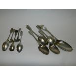 A Victorian silver fiddle patterned tablespoon, together with four silver fiddle pattern dessert