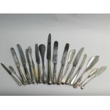 A collection of various silver fish knives, butter knives and silver handled knives, together with