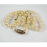 A graduated single strand cultured pearl necklace, comprising eighty-seven cultured pearls with