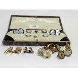 A cased set of mother of pearl and paste mounted cufflinks and dress studs, together with a pair of