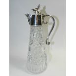 A silver plated mounted glass claret jug