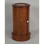 A Victorian mahogany cylinder pot cupboard with inset white marble top over a single door opening