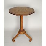 An early 19th century rosewood, ash and satinwood, brass inlaid and bound pedestal games table, in