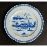 A Caughley dessert plate, circa 1783-93, of lobed and bracketed form, painted in bright blue with