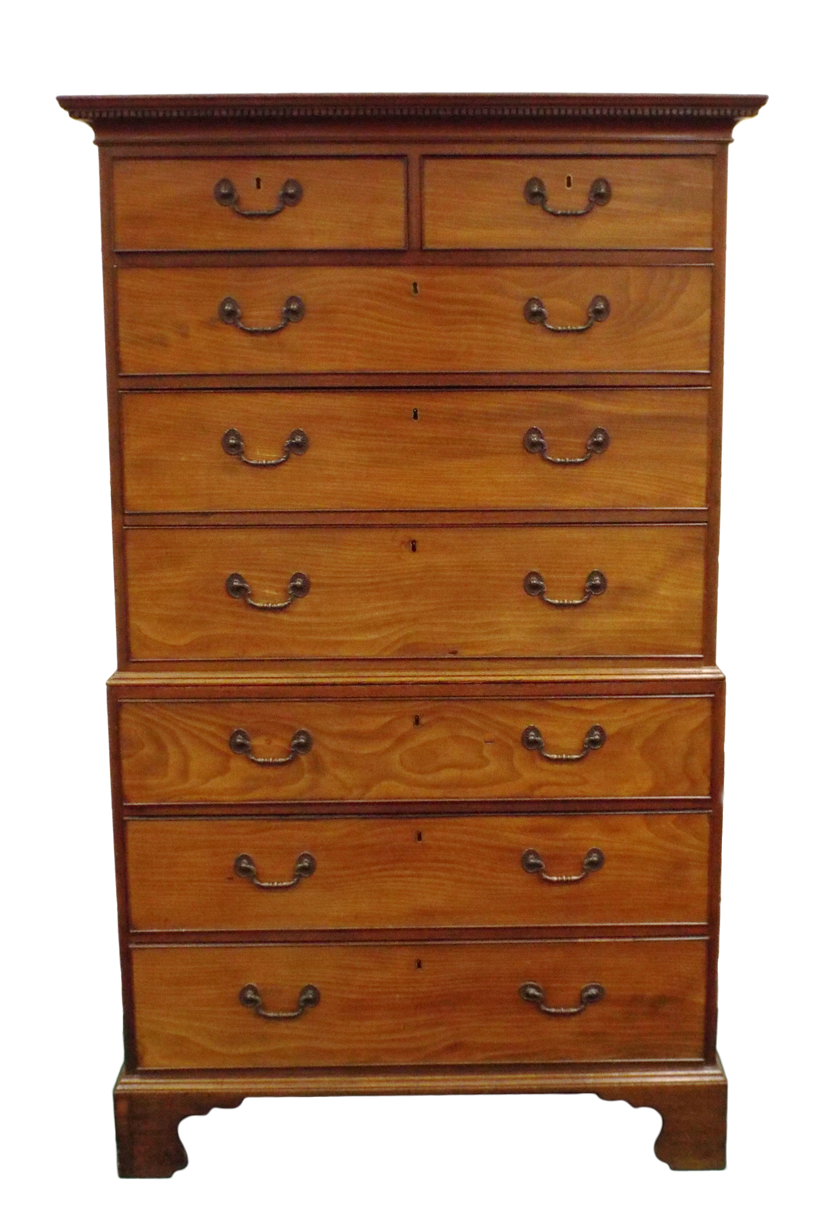 A late George III mahogany chest on chest, the dentil moulded cornice over two short and six long