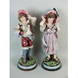 Johann Maresch (Austrian, 19th/20th century), a pair of pottery figures, modelled as a male and