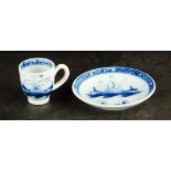 A Caughley Toy coffee cup and saucer, circa 1780-1790, painted in underglaze blue with the Island