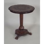 A mid 19th century Irish Killarney walnut and marquetry pedestal occasional table, the top with