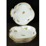 Three Paris porcelain (Feuillet) dessert dishes, circa 1820-1850, the shell-form dishes painted