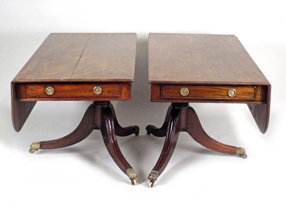 A George IV mahogany triple pillar dining table the rectangular top with moulded edge and drop-leaf - Image 2 of 2