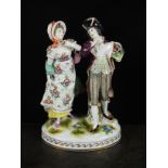 A Rudolstadt Volkstedt porcelain figural group, 20th century, modelled as gallant and companion, on