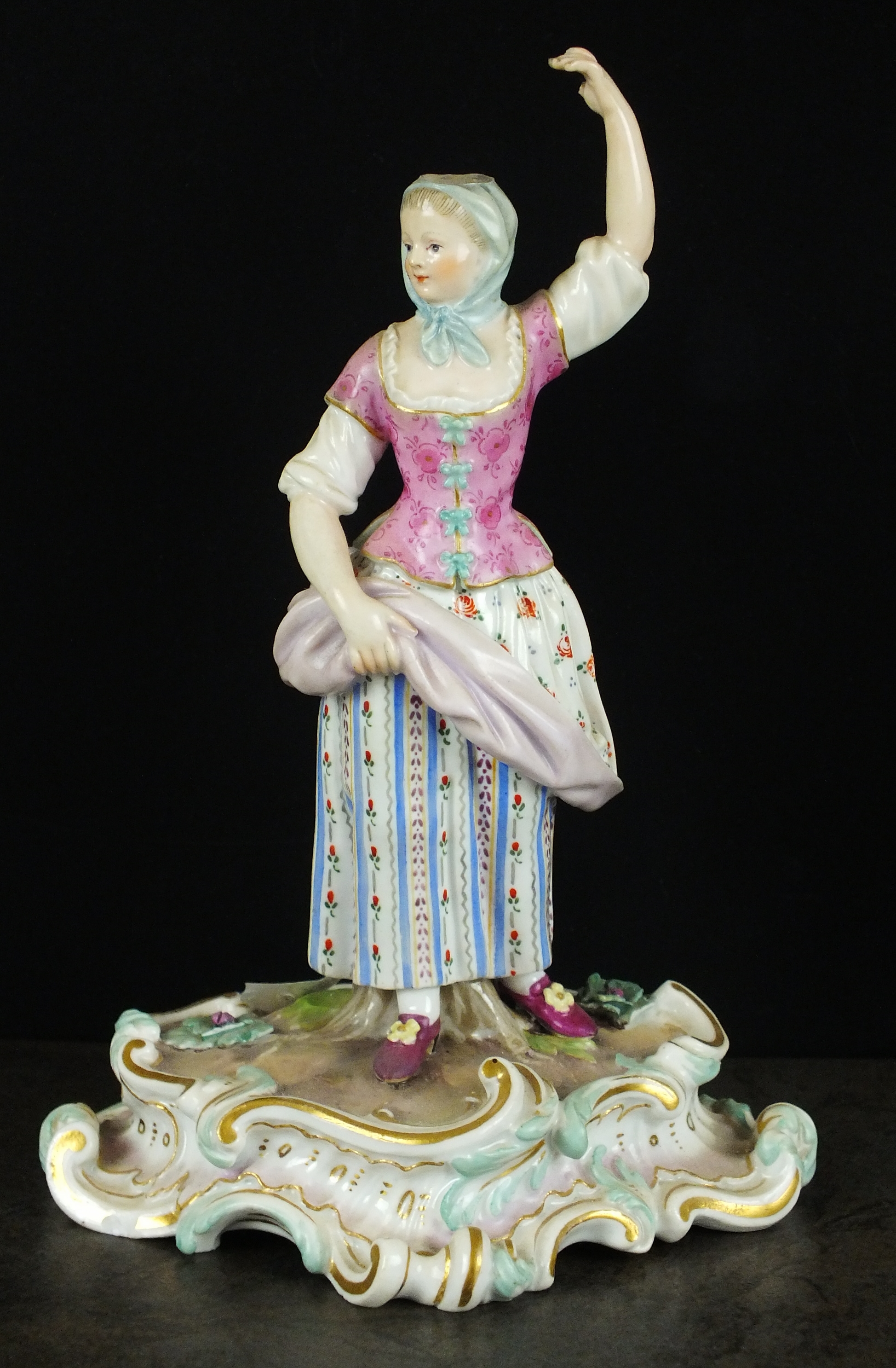 A Meissen porcelain figure of a lady, late 19th/early 20th century, originally one of a pair