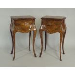 A pair of 20th century Louis XV style quarter veneered bedside chests, the serpentine top over two