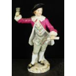 A Meissen porcelain figure of a Town Crier, late 19th/early 20th century, modelled with a bell in