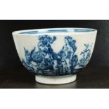 A Caughley tea bowl, circa 1780, transfer-printed in underglaze blue with the Travellers pattern,