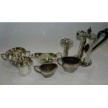 A two handled silver sugar bowl, together with a silver cream jug,