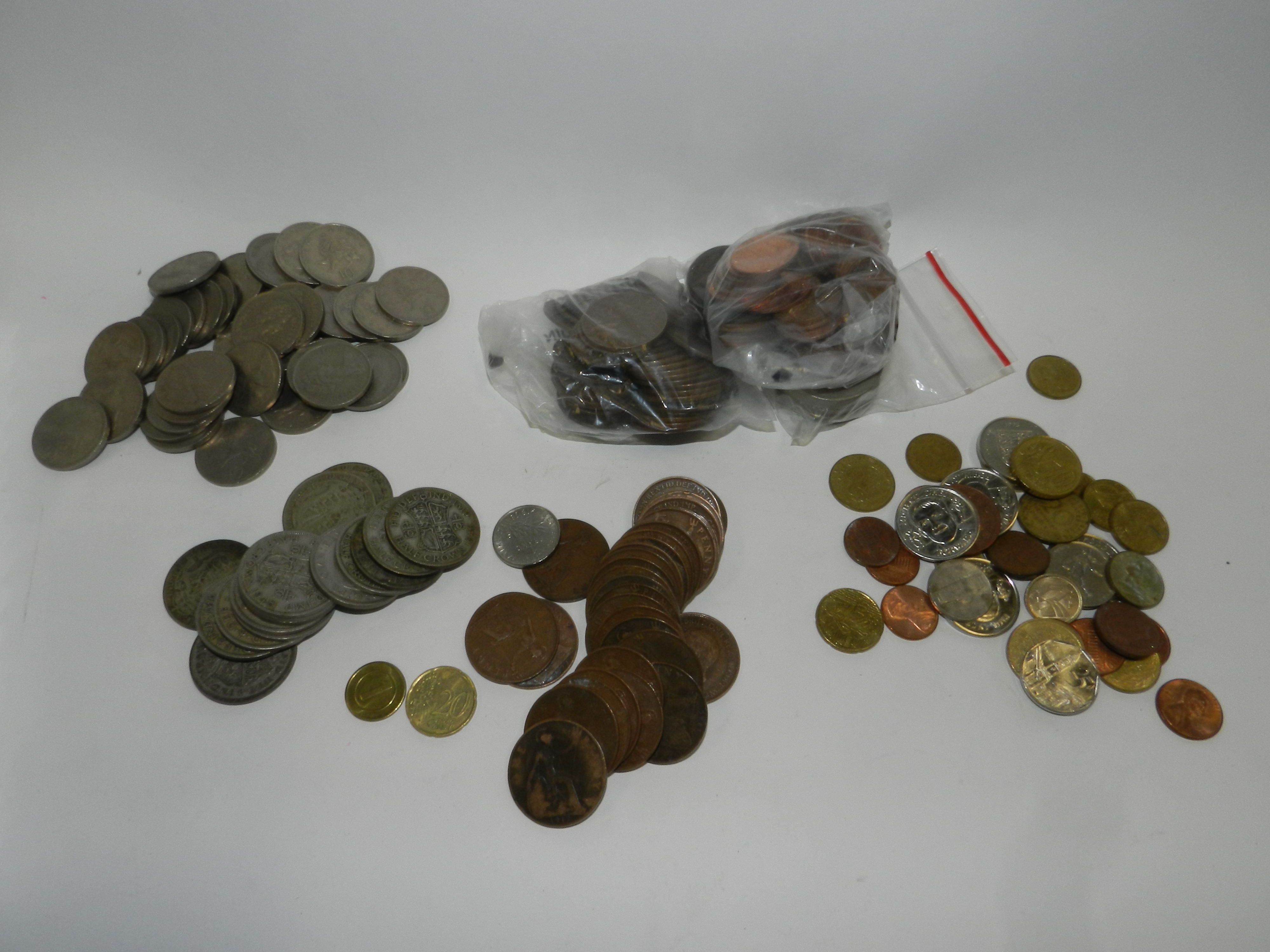 A large collection of various coinage