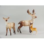 A Beswick stag (leg repaired),