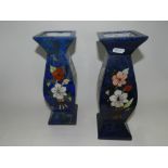 A pair of inlaid stoneware vases, with single presentation case,