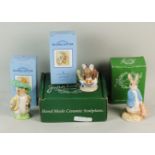 A collection of Beswick/Royal Doulton Beatrix Potter figures in boxes, including Benjamin Bunny,