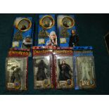 Four boxes of Lord of the Rings toys and models,