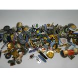 A large collection of various novelty badges