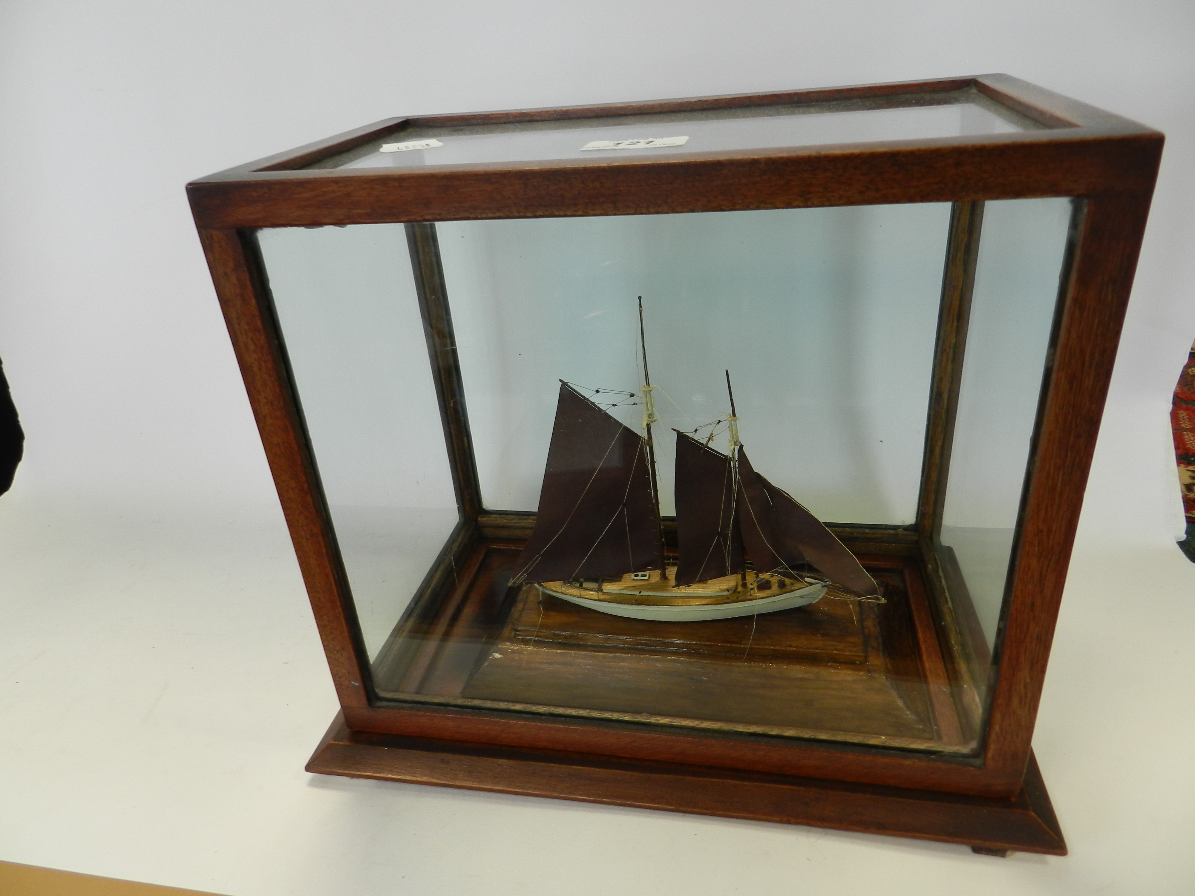 A model boat in presentation case*