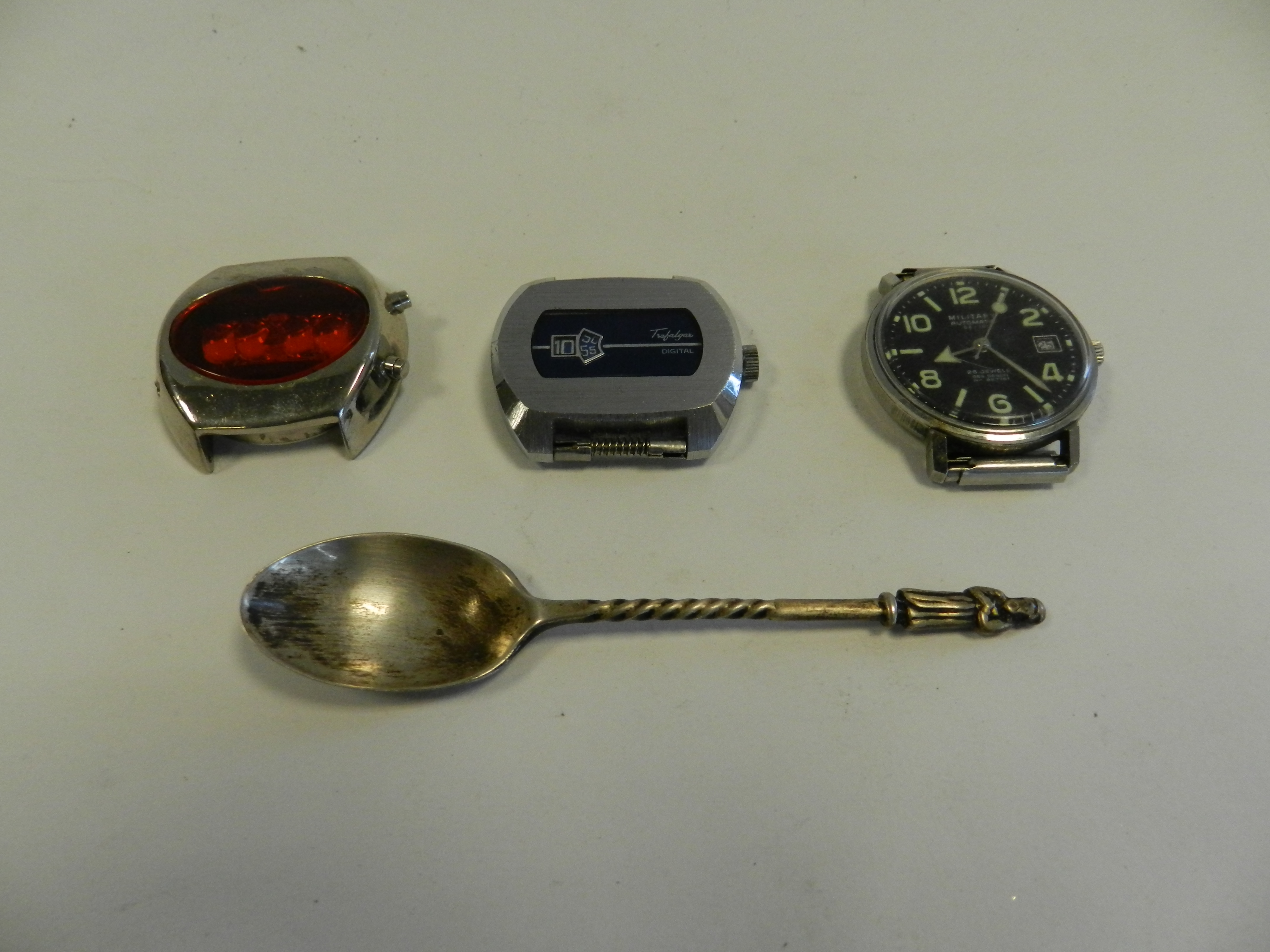 A military automatic 25 jewels watch together with two further watches (lacking straps) and a