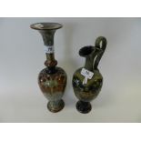 Two Royal Doulton stoneware vases with relief floral decoration (taller vase with repair to neck)