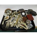 Assorted cutlery together with a brass powder flask, photograph frames, commemorative dish,