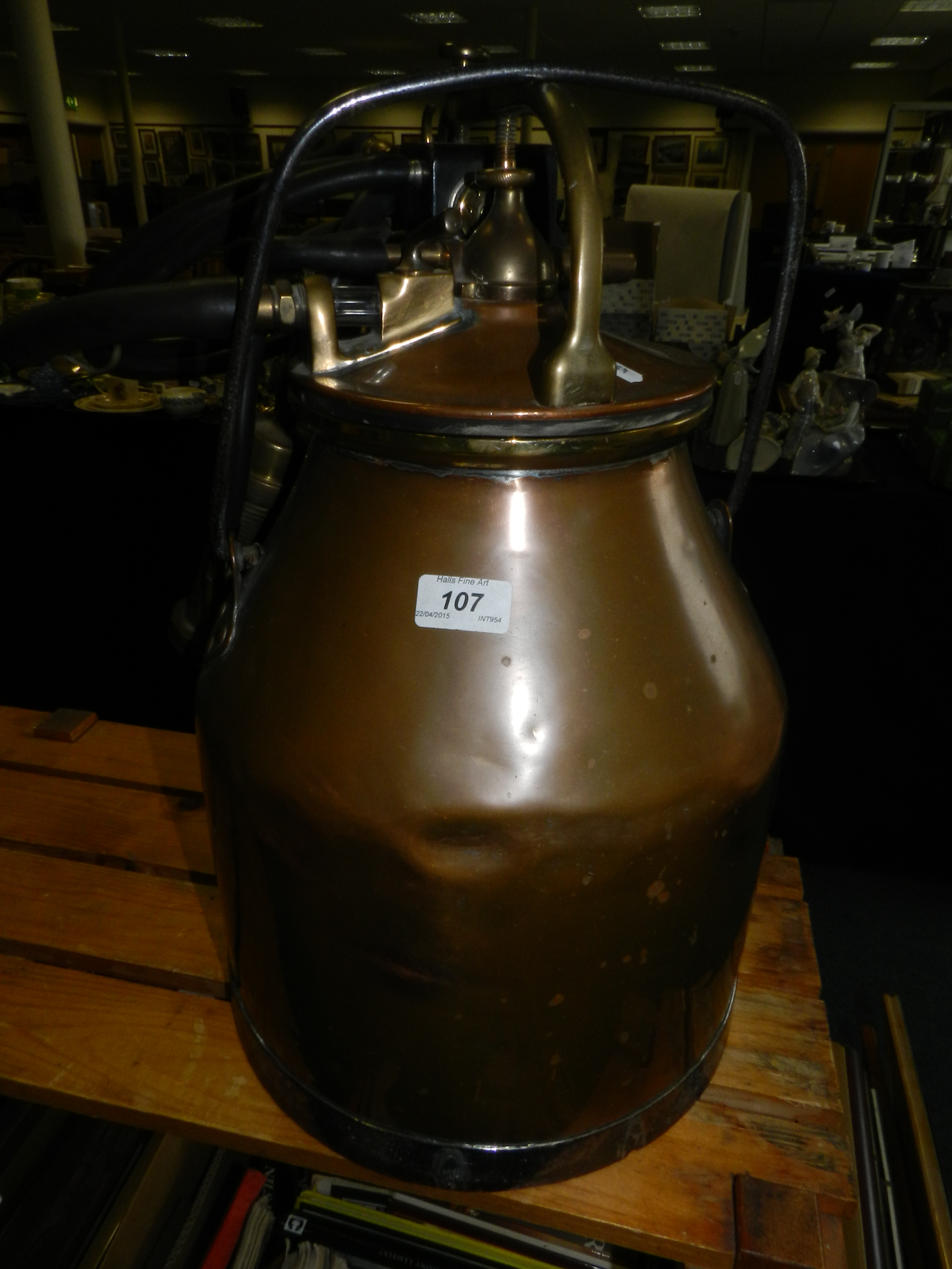 A copper swing handle portable milking unit,