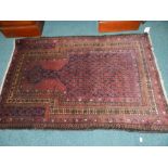 A red and blue ground prayer rug