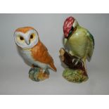 A Beswick model of a Barn Owl together with a Beswick model of a Woodpecker