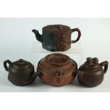 A Chinese Yixing two-tone teapot, 20th century, of stylised tree trunk form,