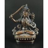 A Chinese Tibetan bronze figure of the goddess Tara, possibly 19th century,