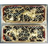 Two modern gilt and red Chinese carved wooden panels, in Chaozhou style, carved in deep relief,