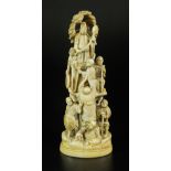 A Japanese ivory carving of Kwan Yin attended by devotees, Meiji Period, late 19th century,