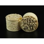 A pair of Chinese Canton Export ivory boxes and covers, mid-19th century, each of cylindrical form,