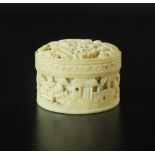 A Chinese Canton export ivory box and cover, late 19th century, of cylindrical form,