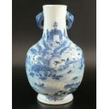 A Chinese blue and white vase, late 19th century, of baluster form with twin elephant head handles,