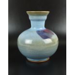 A Chinese Jun Yao style vase, with bulbous body below a short neck with flared lip,