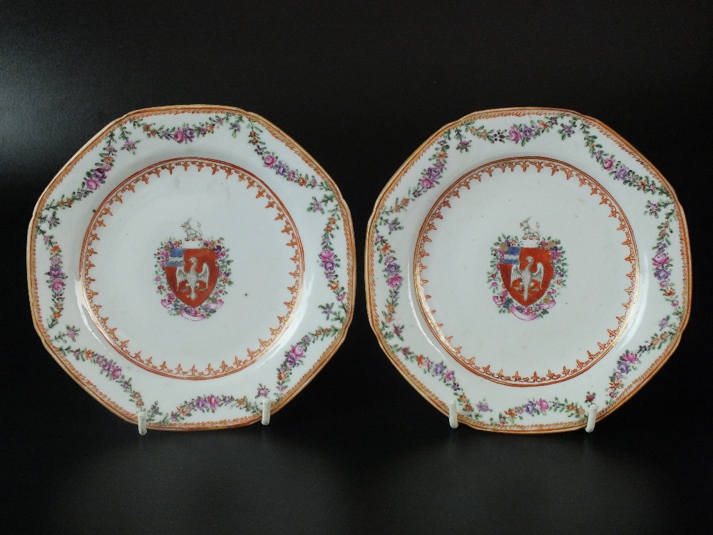 A pair of Chinese export porcelain armorial saucers, 18th century, each of octagonal form,